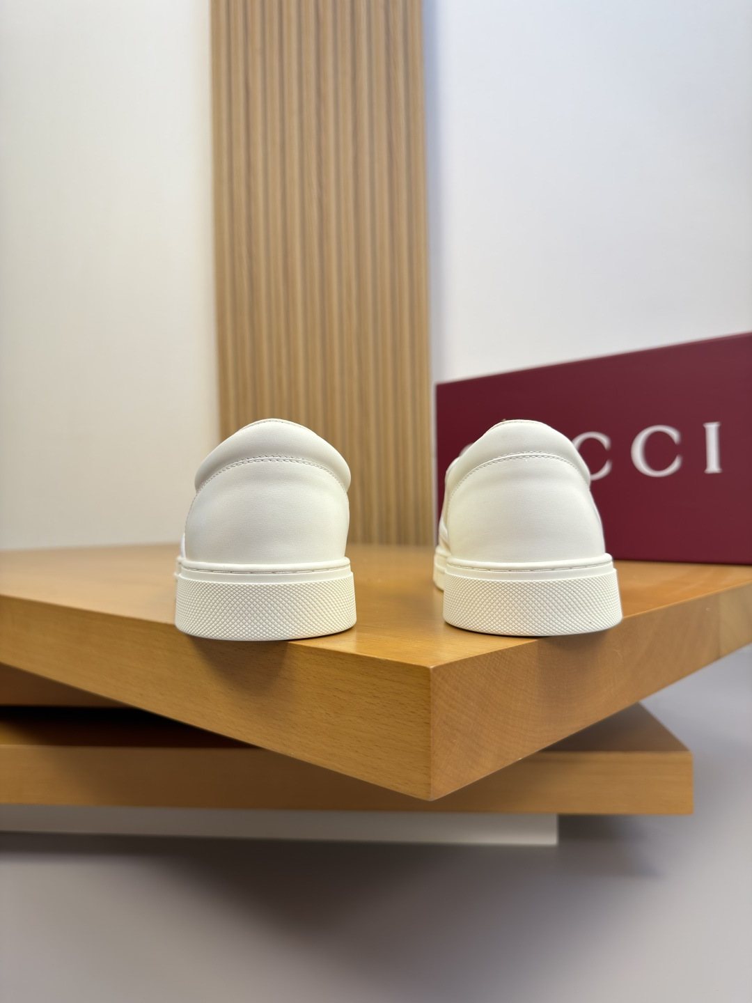 Ivory White Embossed Slip-On Sneakers